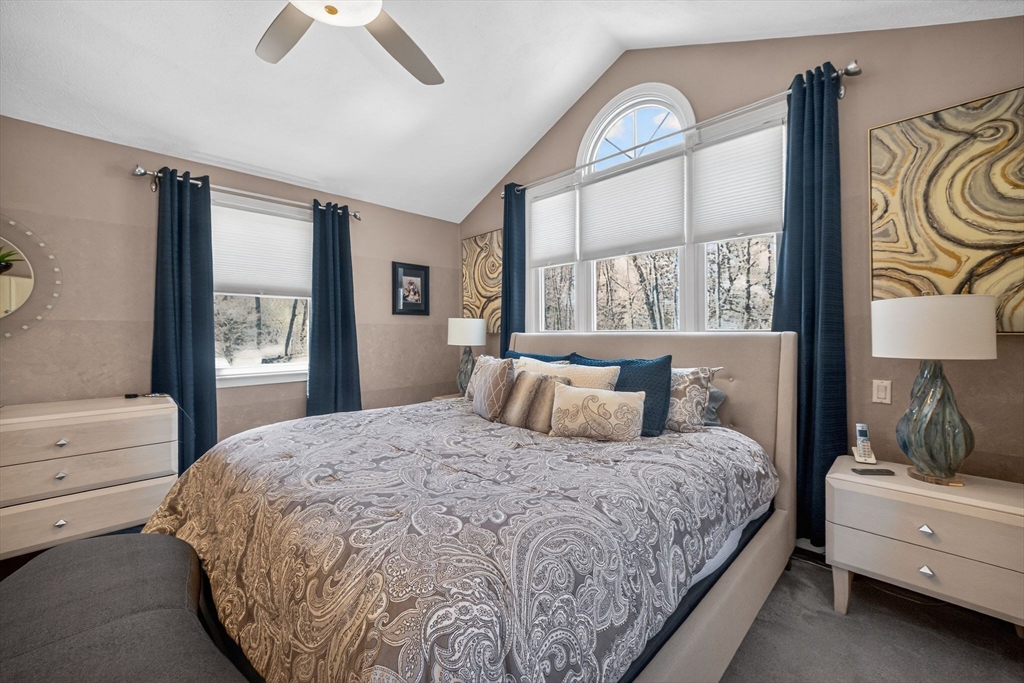 22 McRayne Hill Road Billerica, MA 01821 - Photo 24 of 42 a bedroom with a large bed and a window