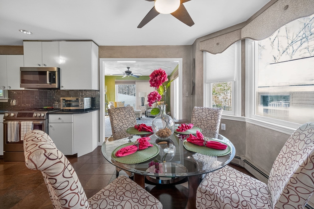 22 McRayne Hill Road Billerica, MA 01821 - Photo 26 of 42 a view of a dining room with furniture