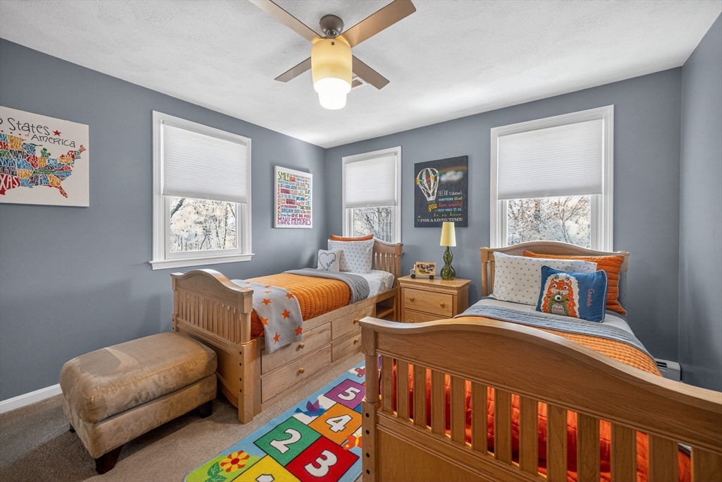 22 McRayne Hill Road Billerica, MA 01821 - Photo 27 of 42 a bedroom with bed couch and window