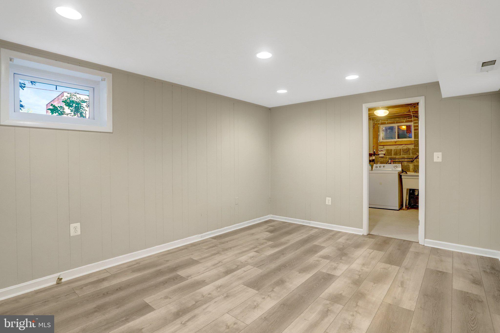 3218 13th Road South Arlington, VA 22204 - Photo 18 of 32 Large Recreation Room Has New Window & LVP Floors!