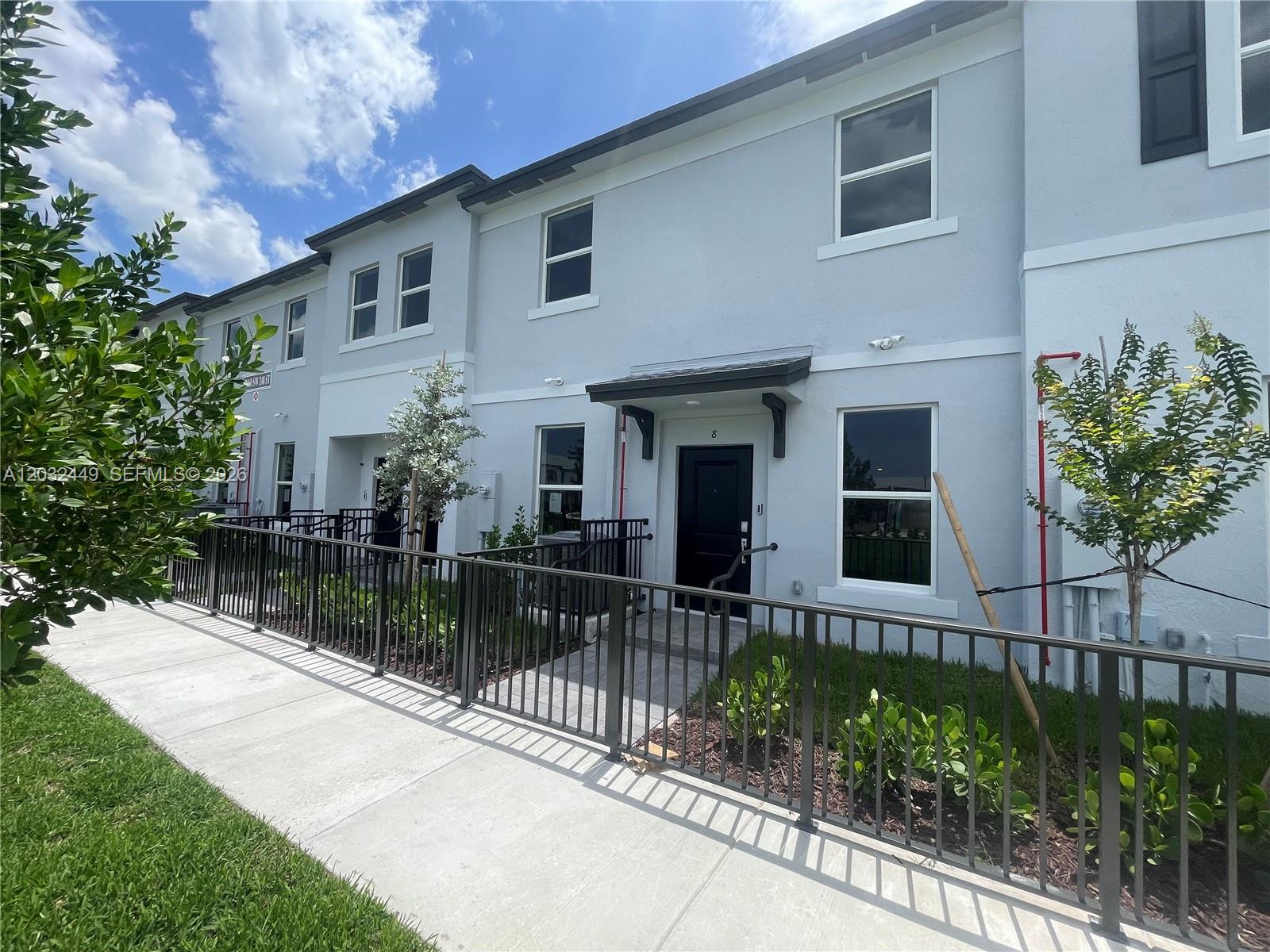 12460 Southwest 248th Street, Unit 8 Homestead, FL 33032 - Photo 1 of 39