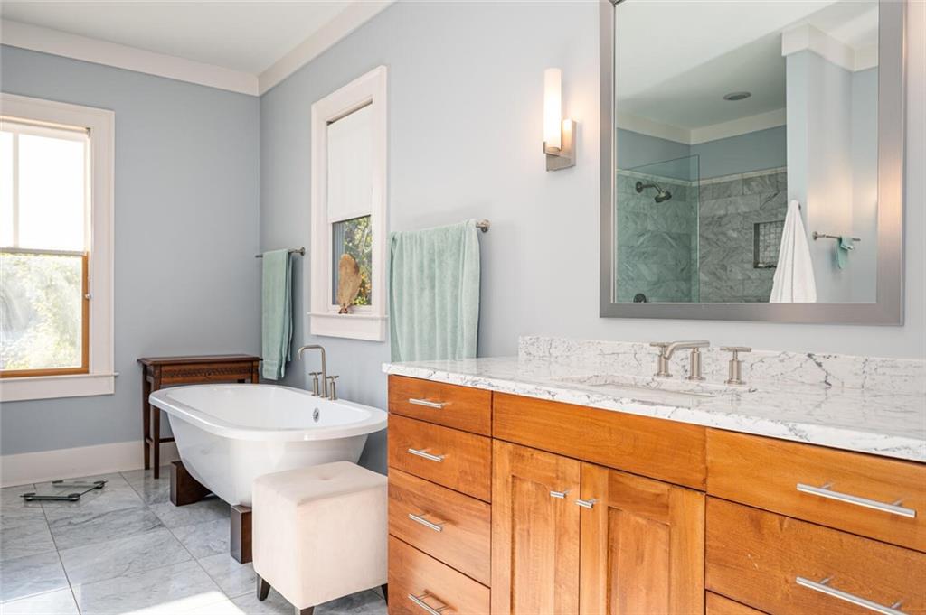 123 Ansley Street Decatur, GA 30030 - Photo 50 of 61 a bathroom with a sink and a mirror