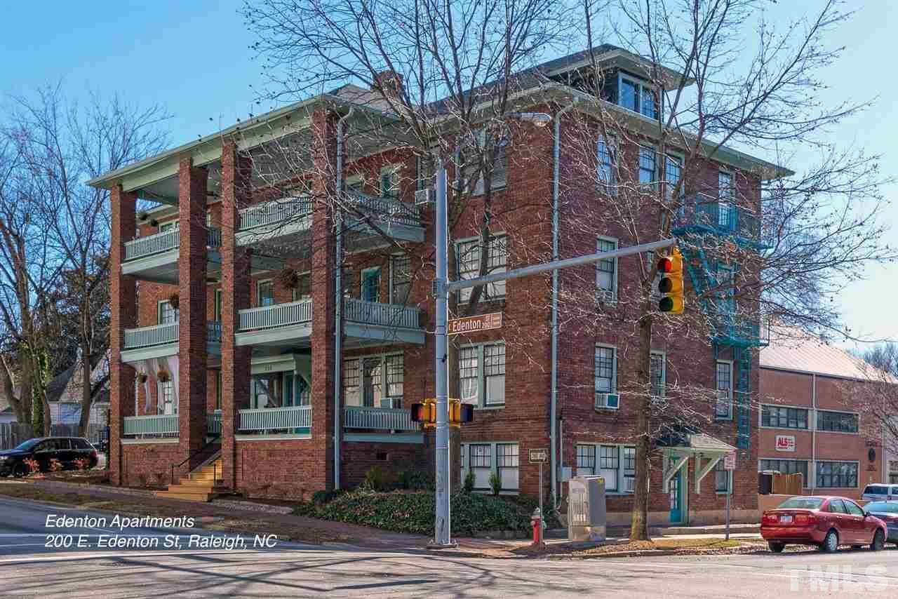 200 East Edenton Street, Unit 4 Raleigh, NC 27601 - Photo 1 of 17 a view of a street with a building and trees in the background