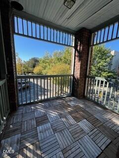 200 East Edenton Street, Unit 4 Raleigh, NC 27601 - Photo 17 of 17 a view of a porch with wooden floor