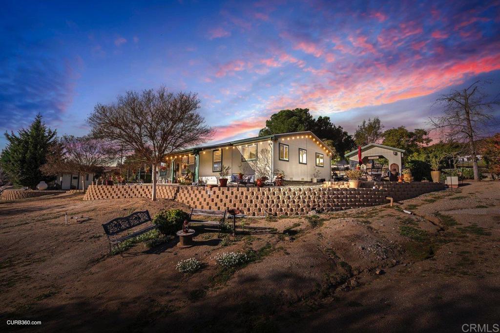 30557 Rock Stone Road Valley Center, CA 92082 - Photo 1 of 1 a view of a house with a yard