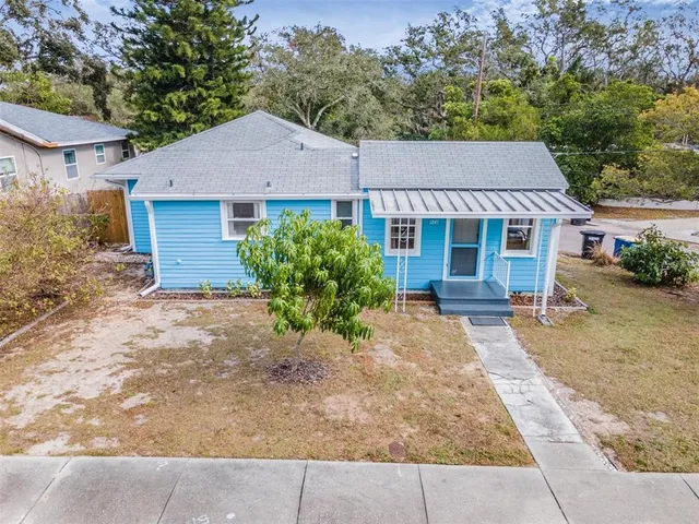 front view of a house with a yard