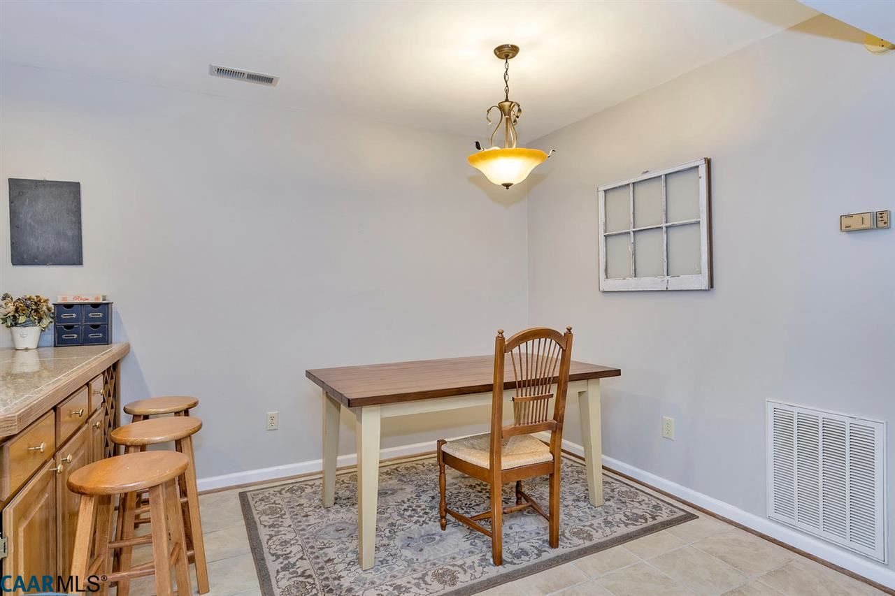 1084 Amber Ridge Road Charlottesville, VA 22901 - Photo 7 of 20 a view of a chairs and table in a room