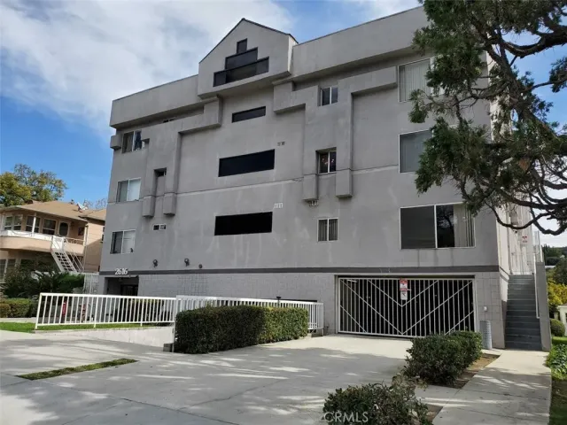 a front view of a house with a garage