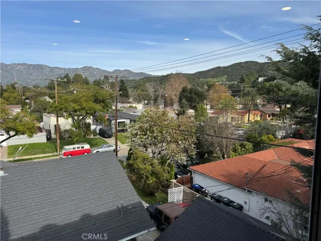 a view of parking space with parked cars