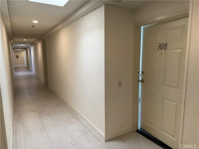 a view of hallway with livingroom