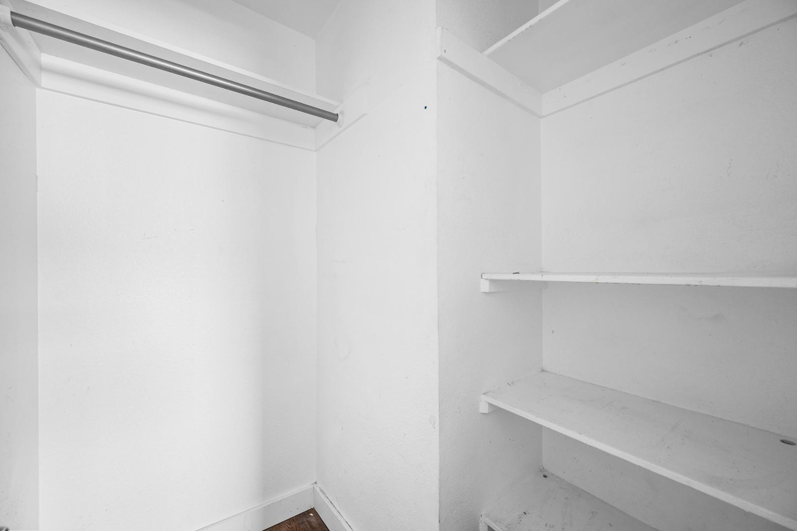 18202 North Cave Creek Road, Unit 252 Phoenix, AZ 85032 - Photo 6 of 15 a view of an empty walk in closet
