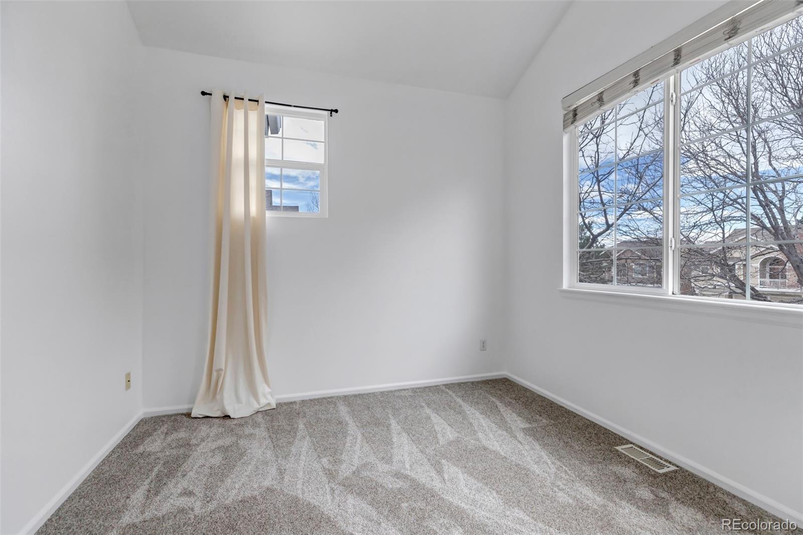 1237 Carlyle Park Circle Highlands Ranch, CO 80129 - Photo 23 of 33 a view of an empty room with a window