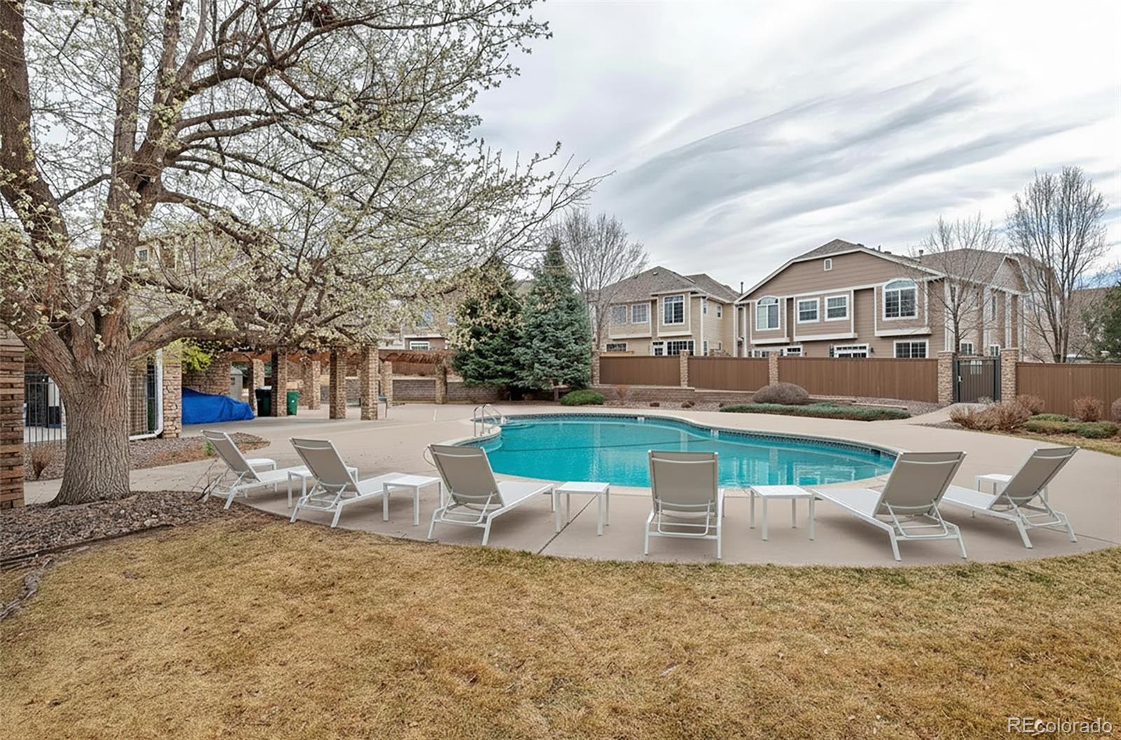1237 Carlyle Park Circle Highlands Ranch, CO 80129 - Photo 30 of 33 a view of a house with a patio