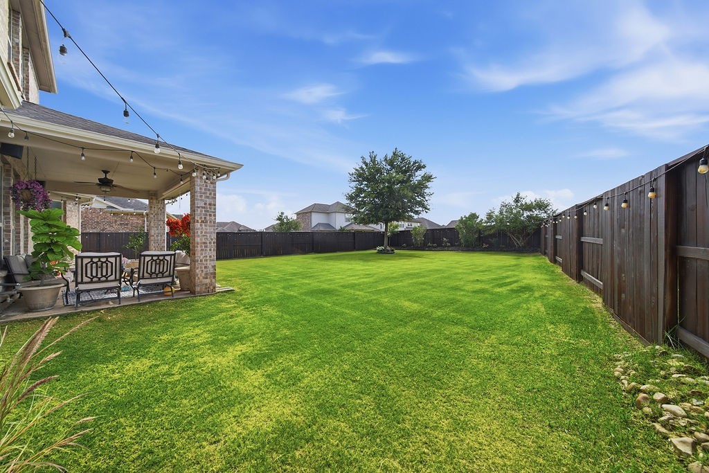 9614 Carson Lane Iowa Colony, TX 77583 - Photo 44 of 50 That grass is gorgeous! Where are emojis when we need them?? Heart-eye emojis would be used here!