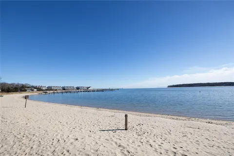 a view of yard with swimming pool and trees