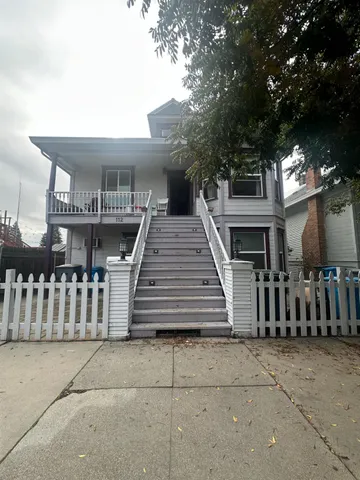 a view of a house with a deck