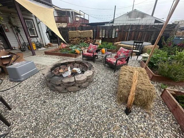 a view of a chairs and table in the patio