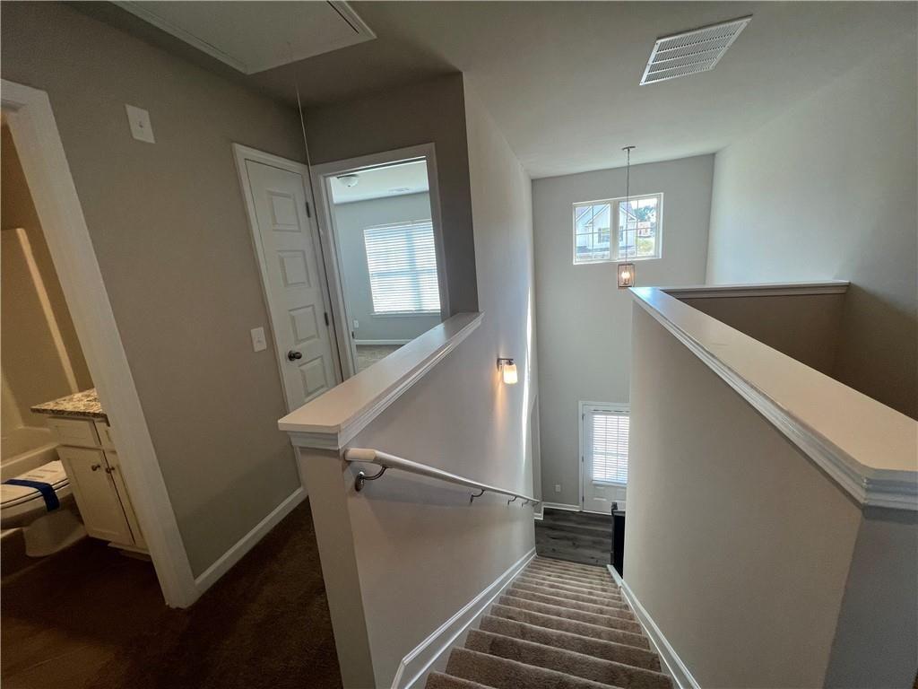 213 Cornwell Way Calhoun, GA 30701 - Photo 17 of 18 a view of an entryway with wooden floor and stairs