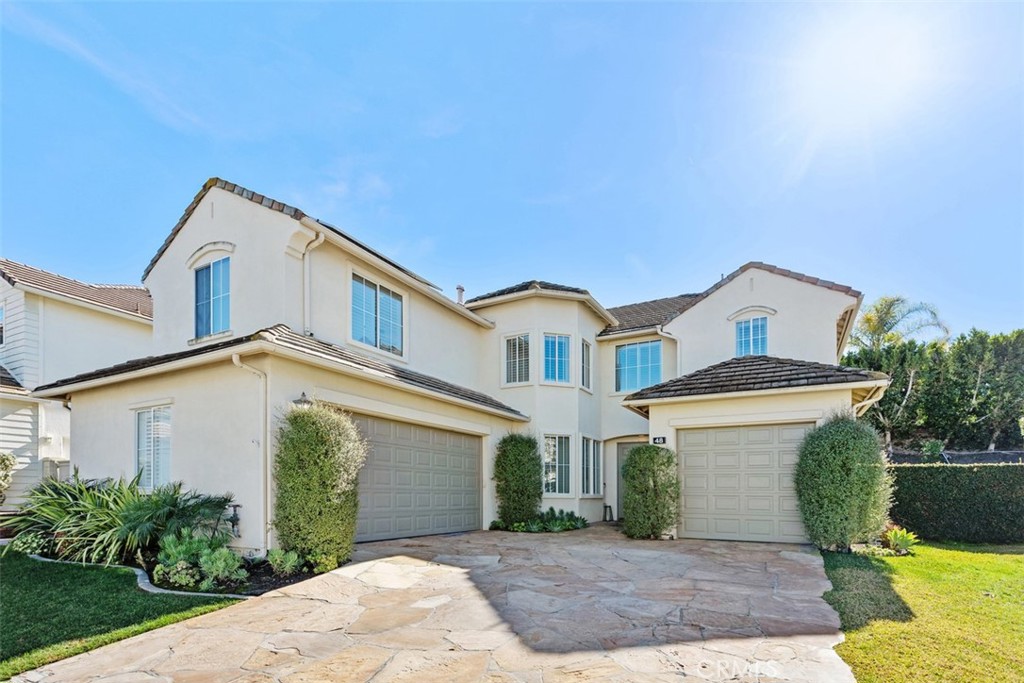48 Creek View Road Coto de Caza, CA 92679 - Photo 2 of 39 a front view of a house with garden