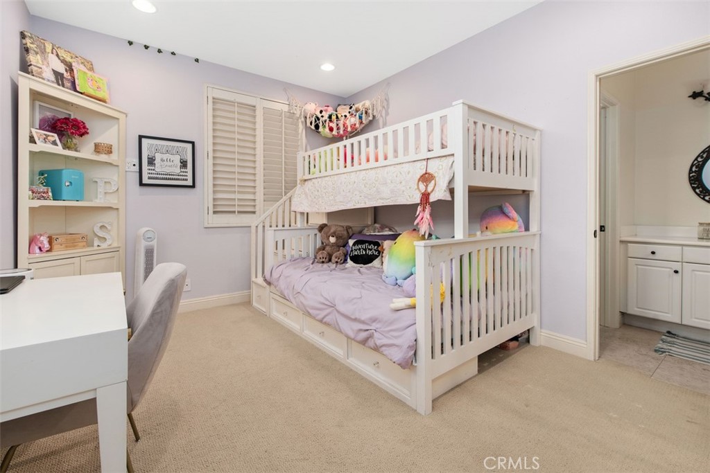 48 Creek View Road Coto de Caza, CA 92679 - Photo 22 of 39 a bedroom with furniture and a baby crib