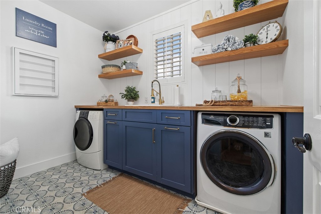 48 Creek View Road Coto de Caza, CA 92679 - Photo 25 of 39 a view of a room with rack and wooden floor