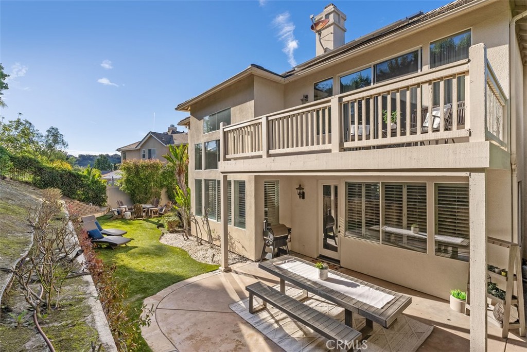 48 Creek View Road Coto de Caza, CA 92679 - Photo 29 of 39 a view of a house with backyard sitting area and garden