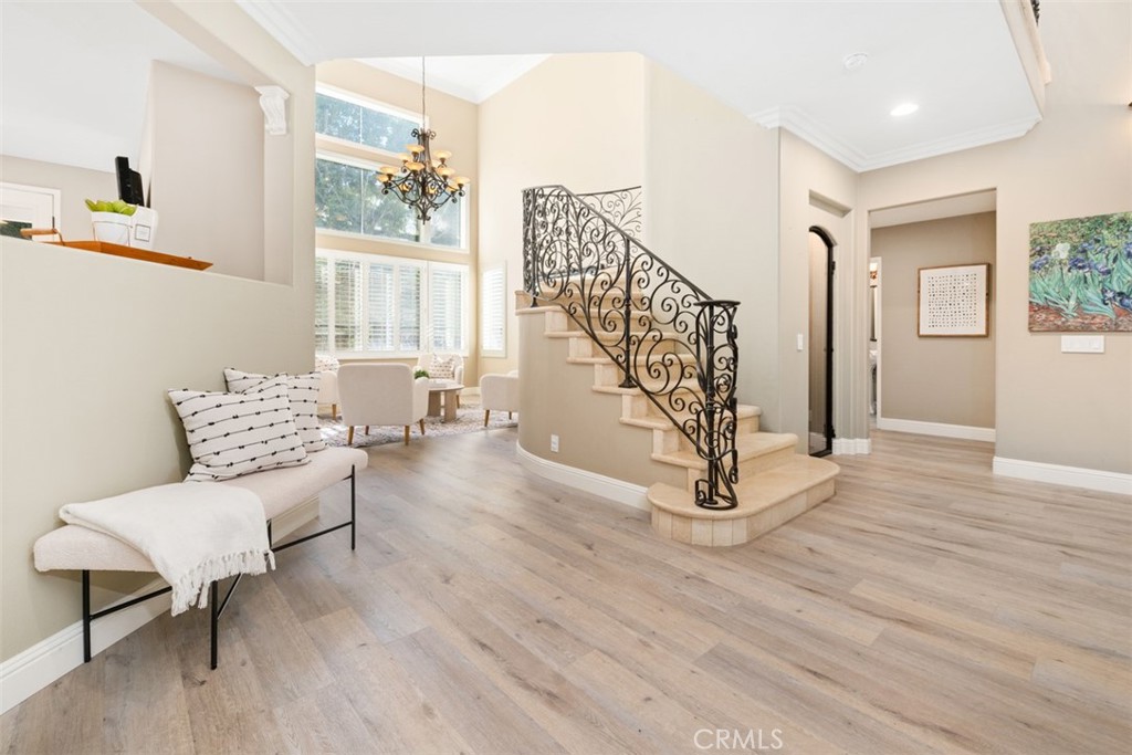 48 Creek View Road Coto de Caza, CA 92679 - Photo 3 of 39 a living room with furniture and a wooden floor