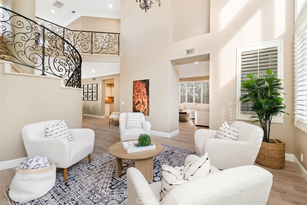 48 Creek View Road Coto de Caza, CA 92679 - Photo 4 of 39 a living room with furniture flowerpot and a window