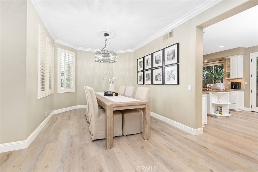 48 Creek View Road Coto de Caza, CA 92679 - Photo 6 of 39 a view of a room with wooden floor windows and chandelier