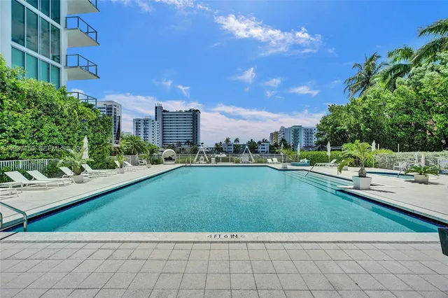 a room with gym equipment and a window