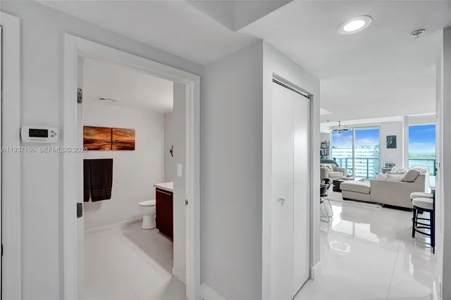 a view of a lake with tall building