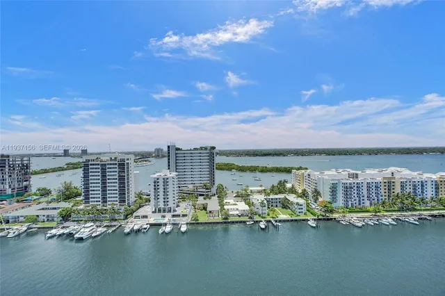 a view of a lake with a nearby beach