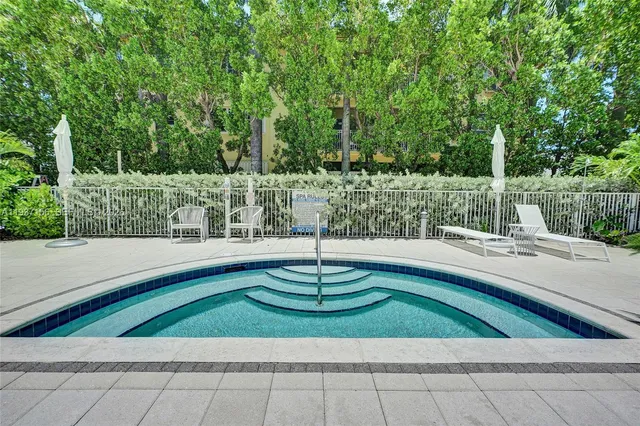 a view of a city with lawn chairs