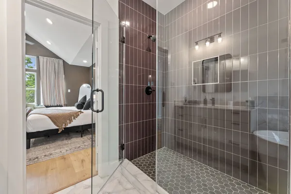 a bathroom with a sink and mirror