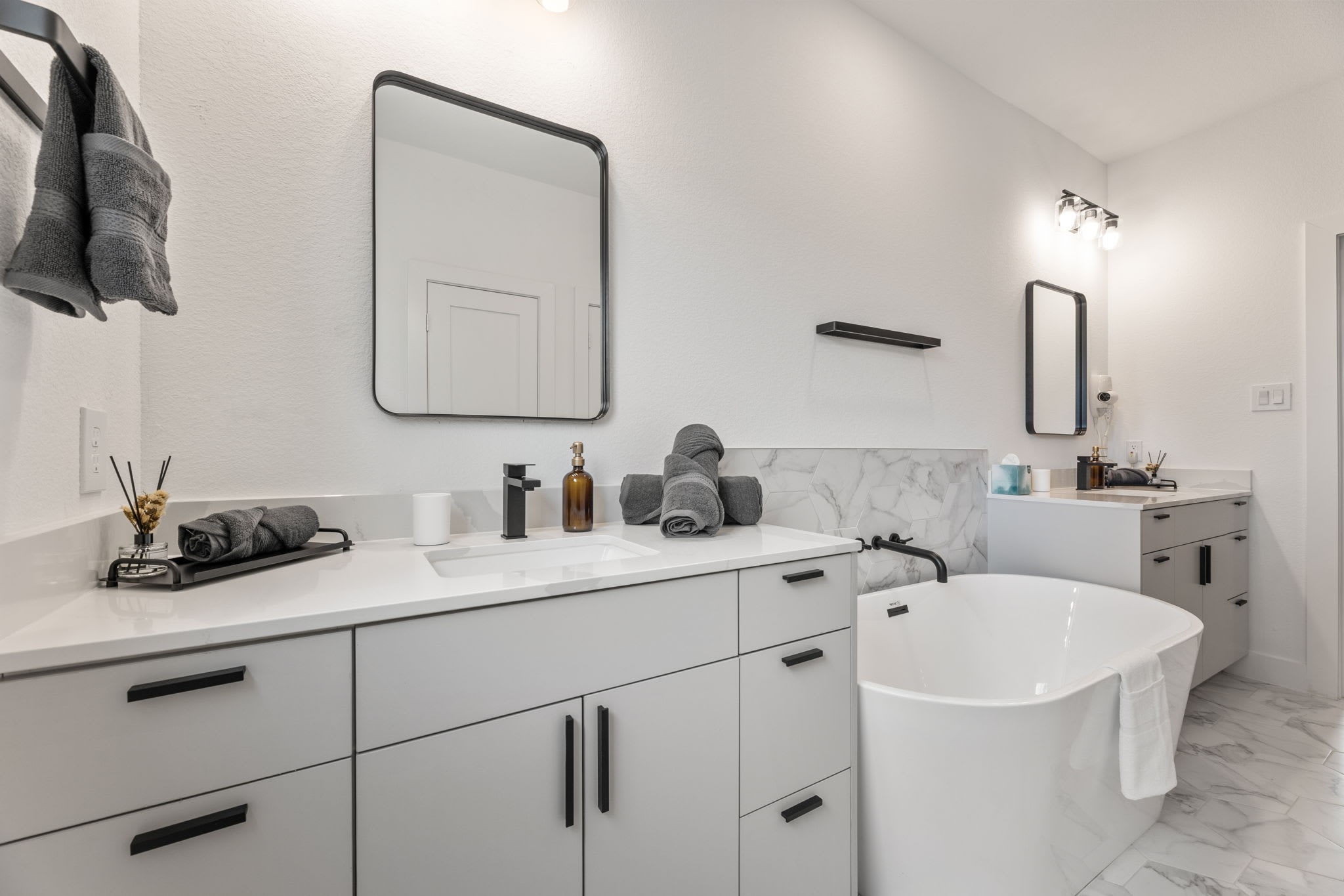 5502 Texas Street Houston, TX 77011 - Photo 15 of 33 a bathroom with a sink and a mirror
