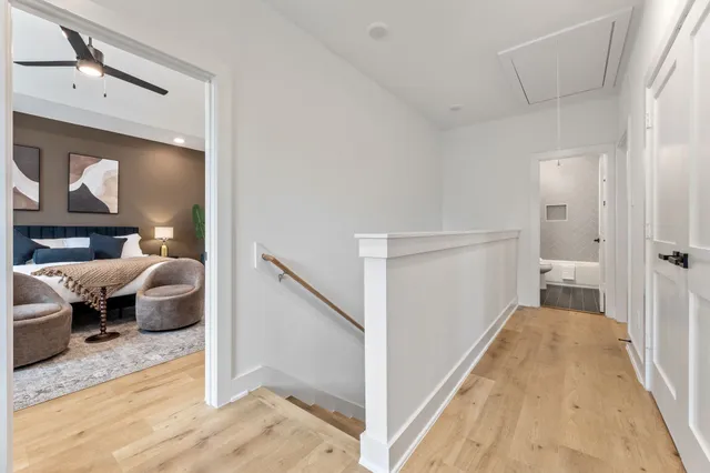 a en suite bathroom with a toilet sink and mirror