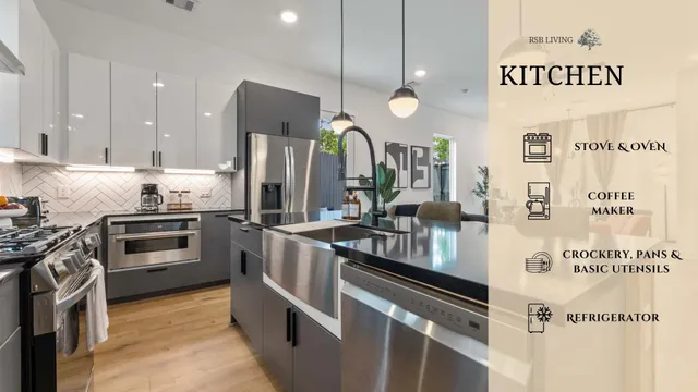 a kitchen with stainless steel appliances granite countertop a stove a sink and a refrigerator