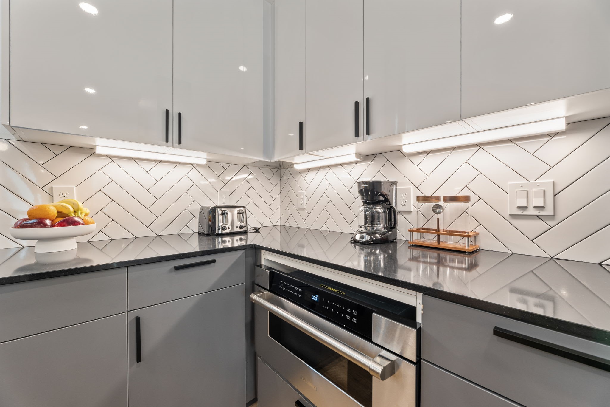 5502 Texas Street Houston, TX 77011 - Photo 7 of 33 a kitchen with a sink and cabinets