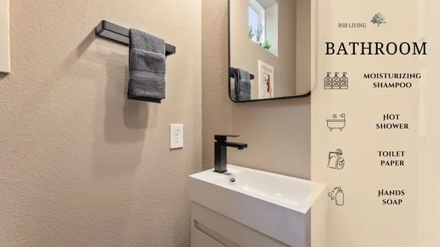 a bathroom with a sink and mirror