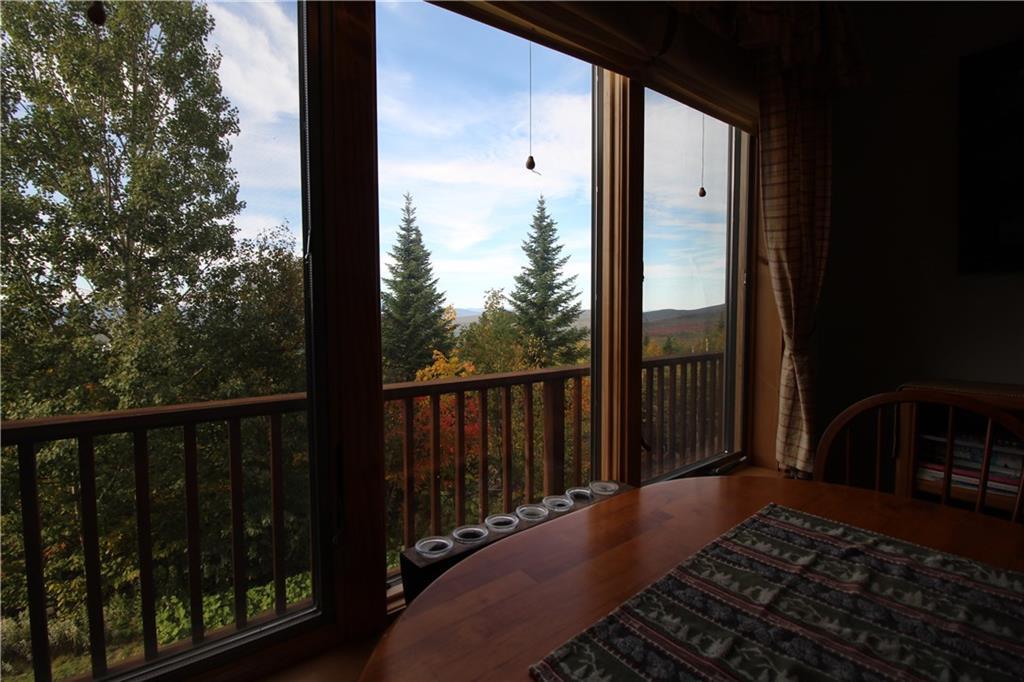 75 Rock Pond Road, Unit 1037 Sandy River Plt, ME 04970 - Photo 12 of 40 dining nook view