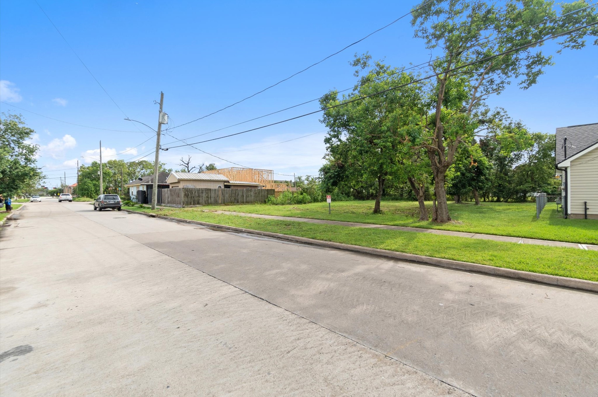 1711 Benson Street Houston, TX 77020 - Photo 3 of 11 a view of a house with a big yard and potted plants