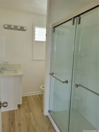 a bathroom with a shower and a shower