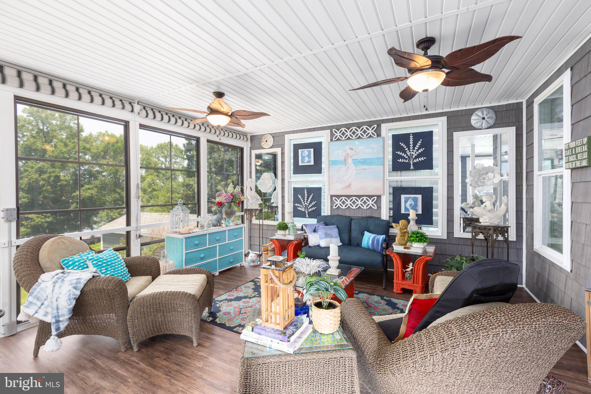 565 Busbees Point Road Bumpass, VA 23024 - Photo 21 of 135 Huge, comfortable 3 season room w/lake views