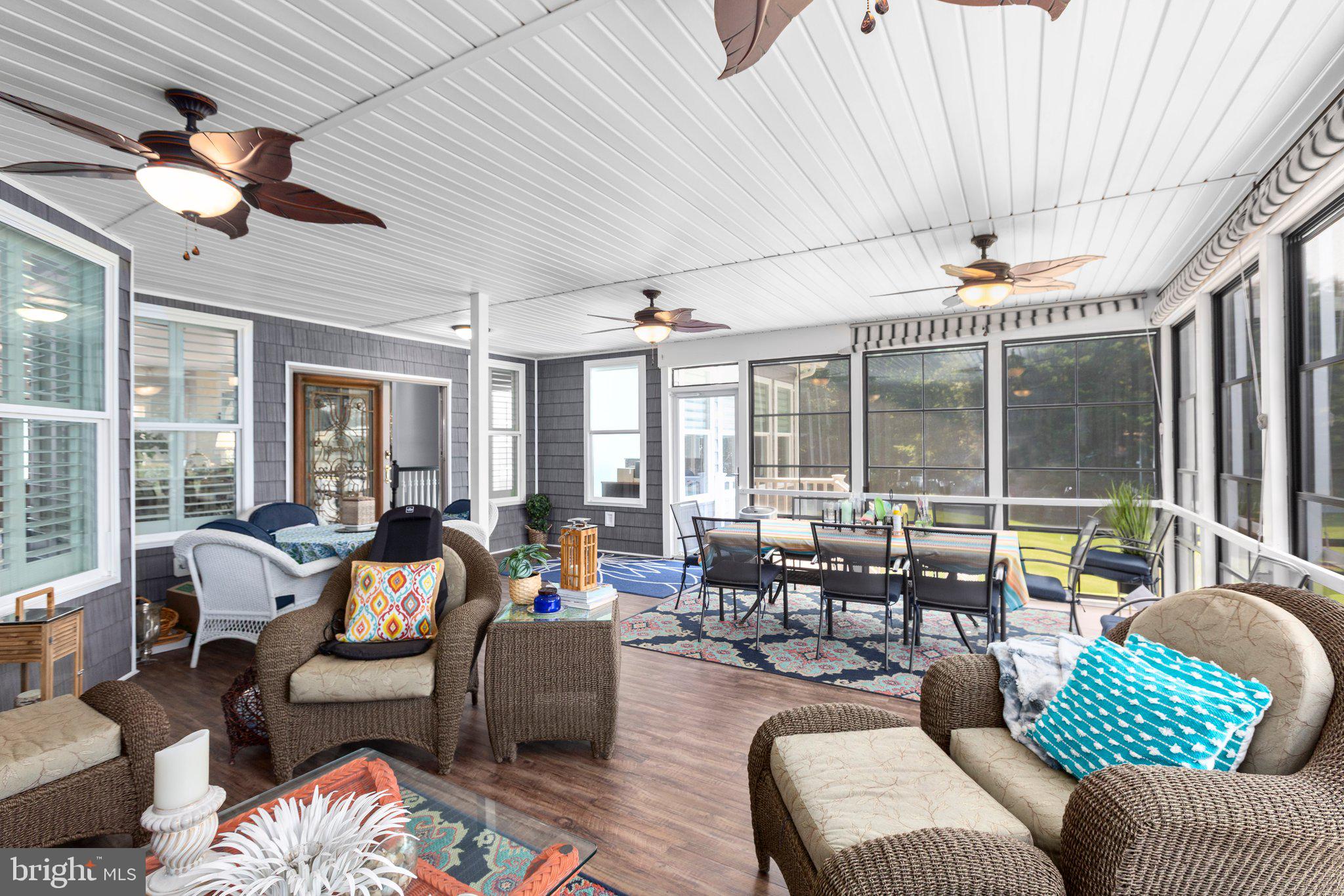 565 Busbees Point Road Bumpass, VA 23024 - Photo 22 of 135 Huge, comfortable 3 season room w/lake views