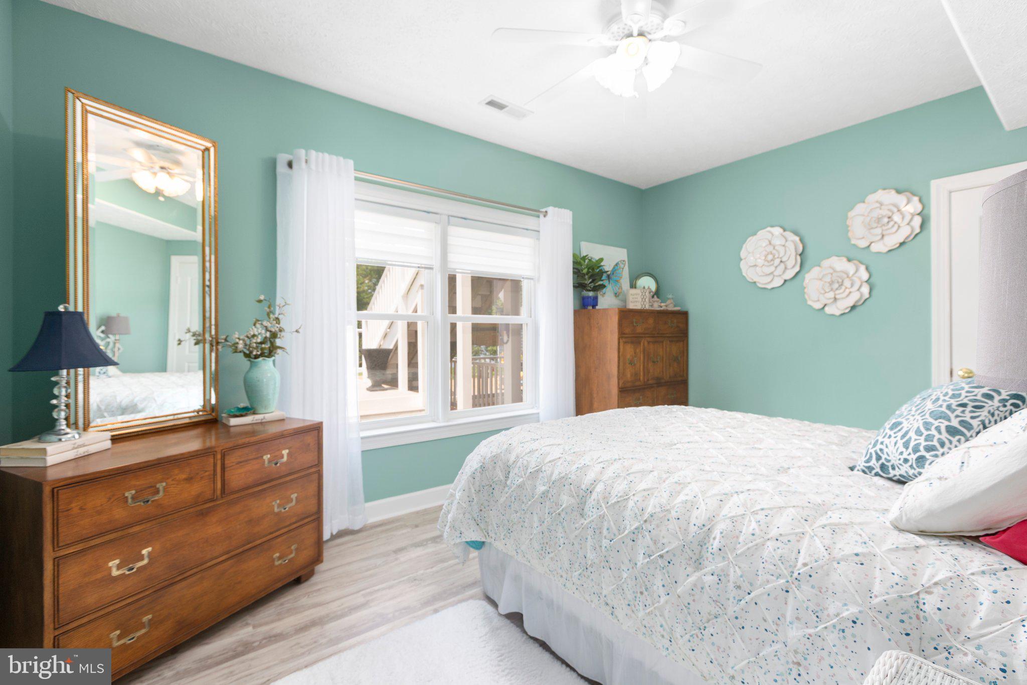 565 Busbees Point Road Bumpass, VA 23024 - Photo 50 of 135 Lower level bedroom with lake views