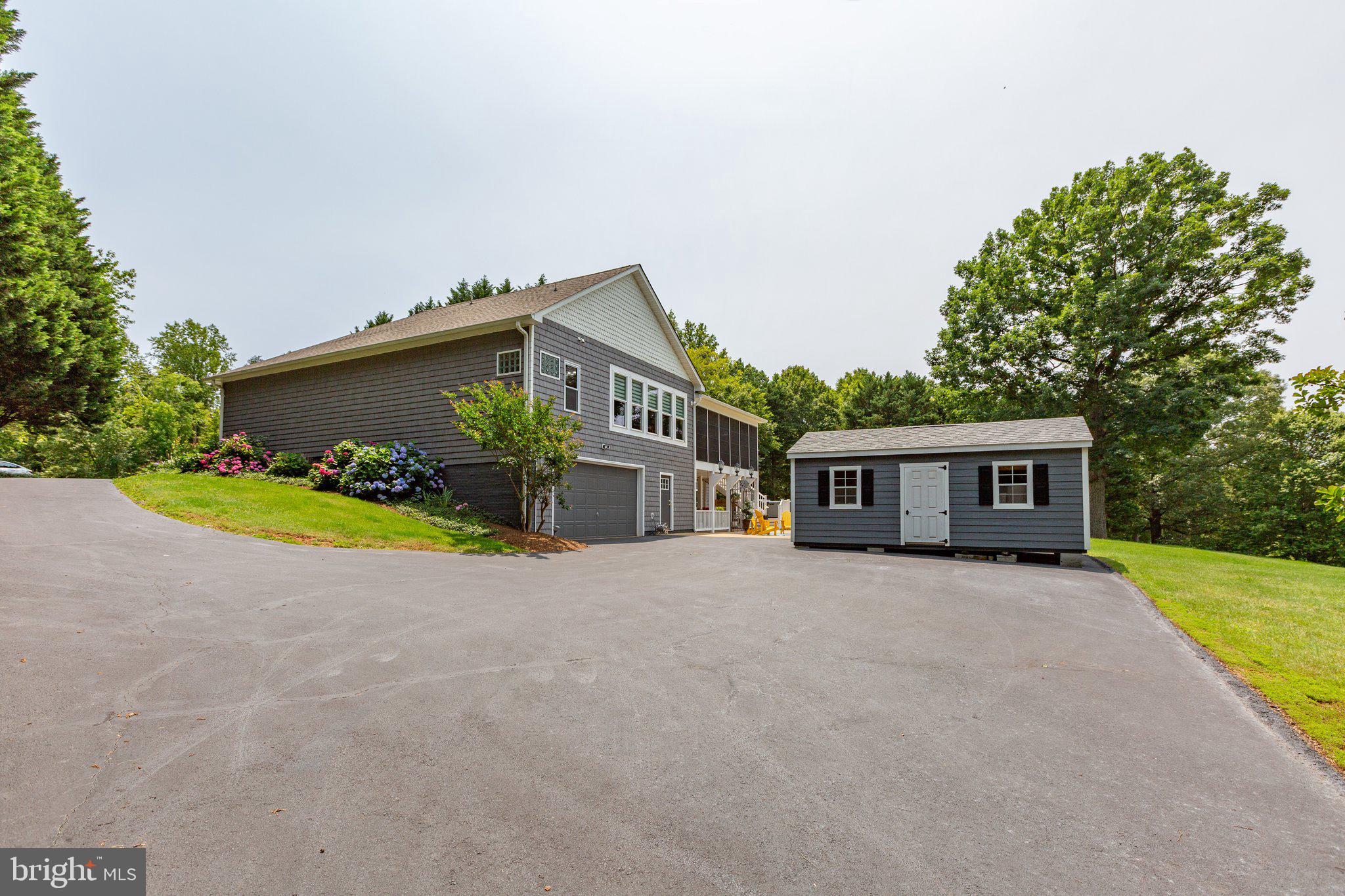 565 Busbees Point Road Bumpass, VA 23024 - Photo 53 of 135 Rear of home with garage/shed