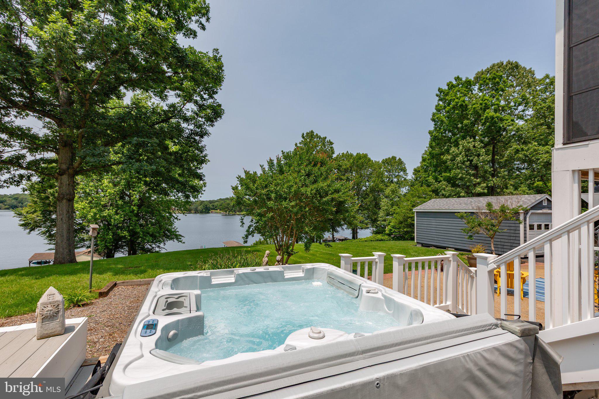 565 Busbees Point Road Bumpass, VA 23024 - Photo 64 of 135 Hot tub with lake views