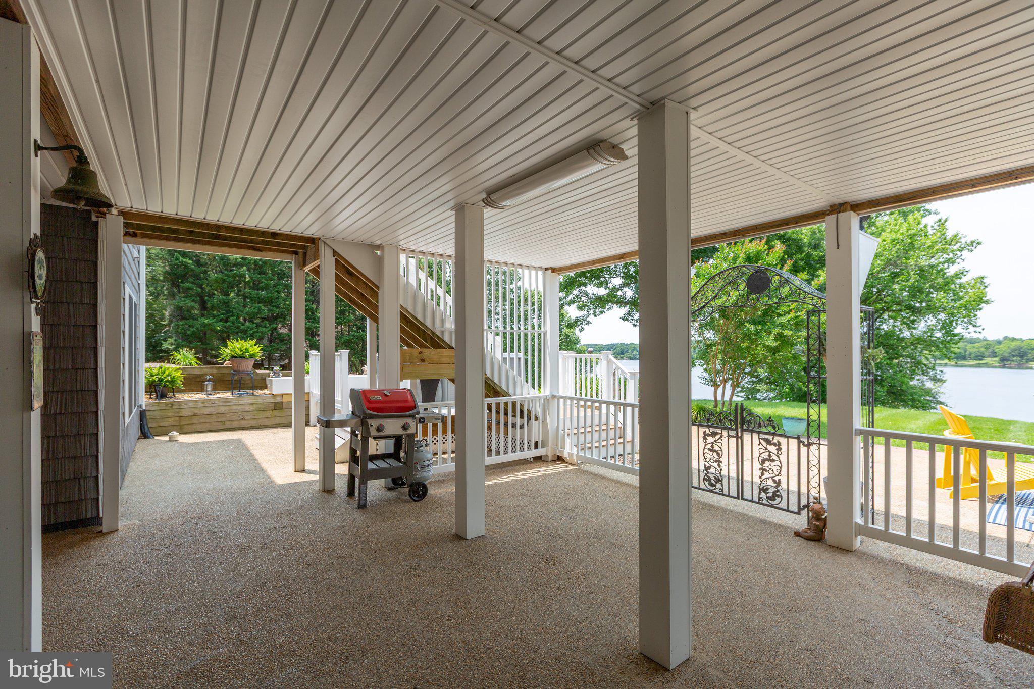 565 Busbees Point Road Bumpass, VA 23024 - Photo 66 of 135 Covered patio with lake views