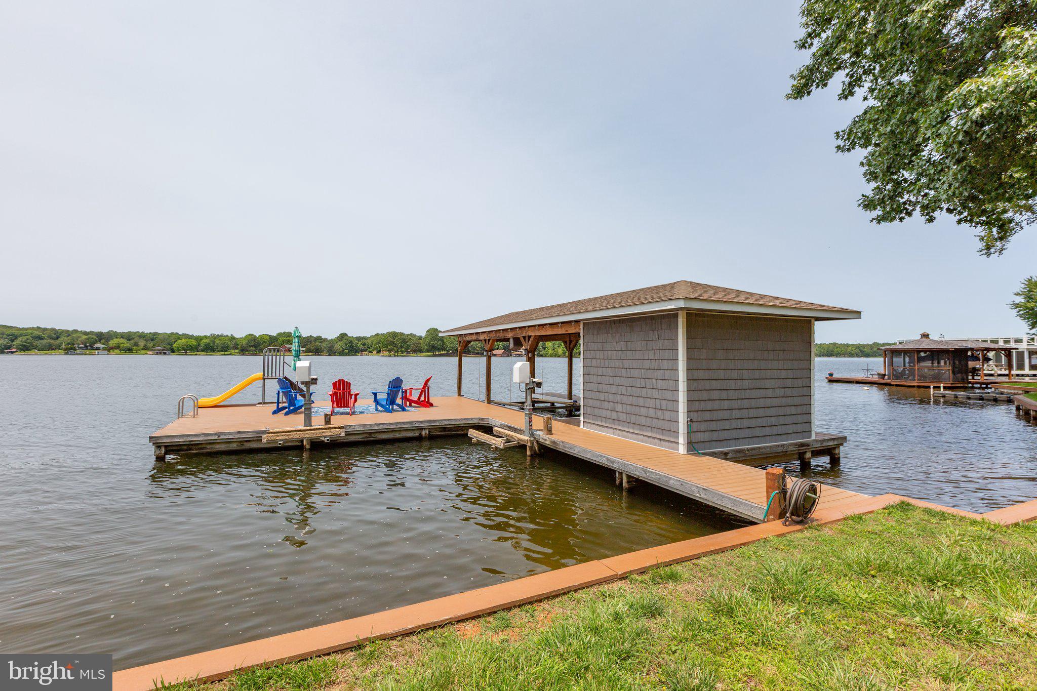 565 Busbees Point Road Bumpass, VA 23024 - Photo 73 of 135 Boathouse with sundeck and slide