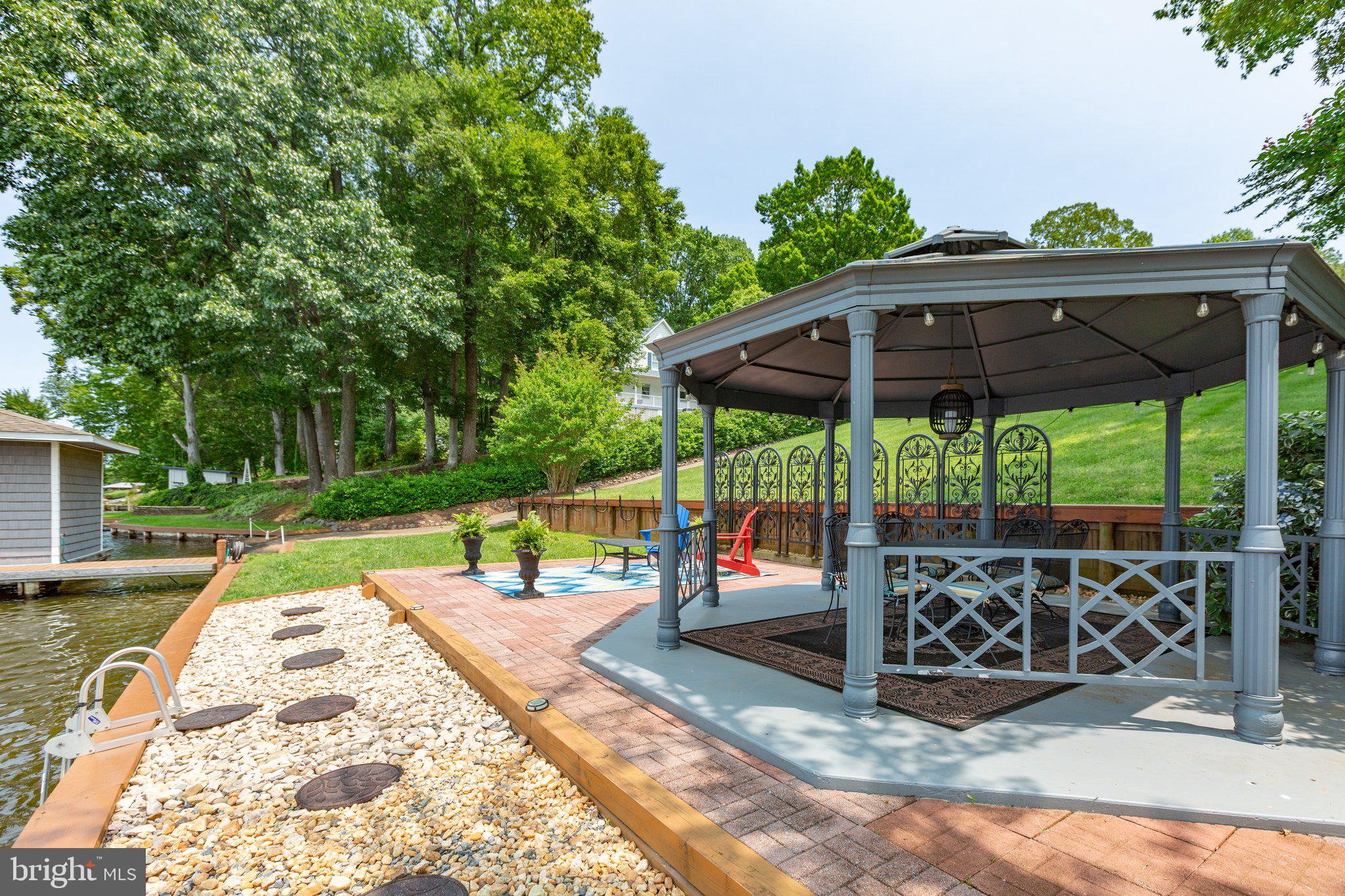 565 Busbees Point Road Bumpass, VA 23024 - Photo 83 of 135 Play area with patio and gazebo